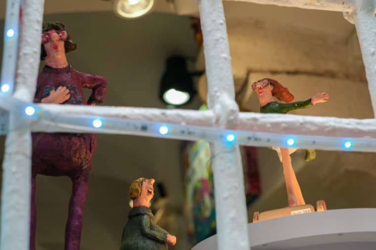whimsical clay figures display