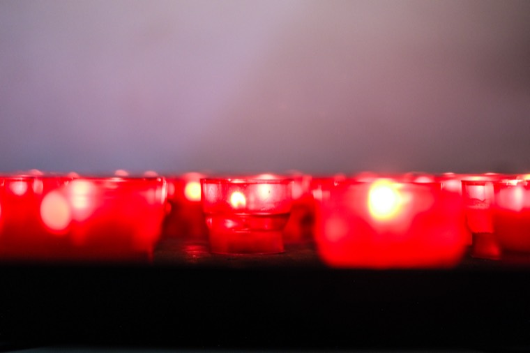 red votive candles row
